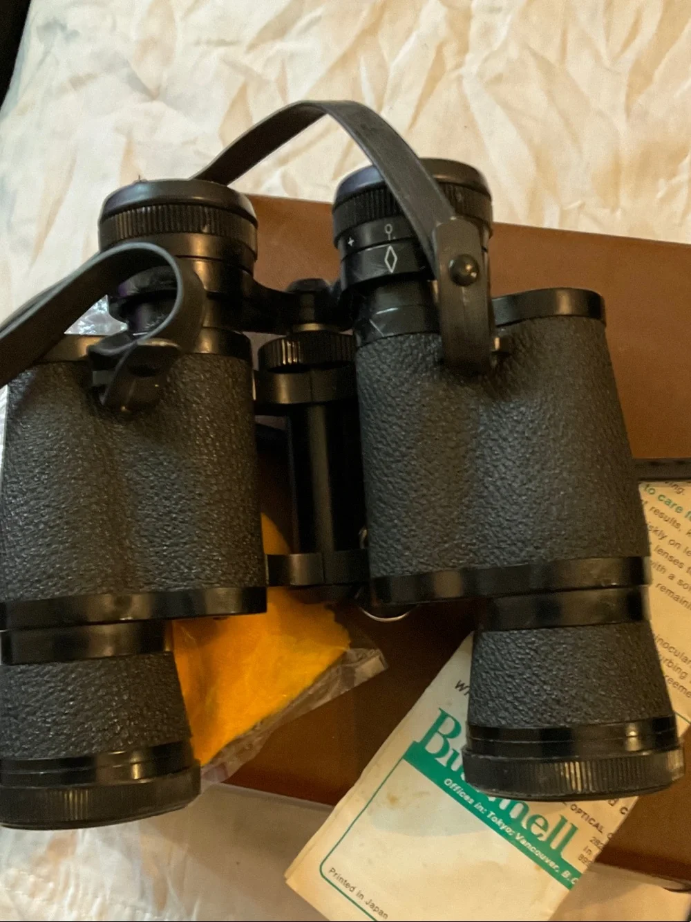 Bushnell Black Binoculars with Brown Case and Neck Strap